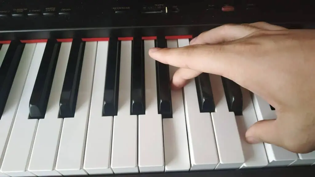 Tuck your thumb when playing the arpeggio